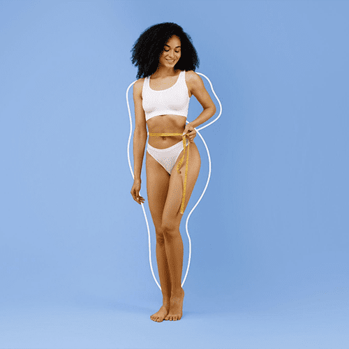 A smiling woman stands against a blue background wearing a white sports bra and underwear. She holds a yellow measuring tape around her waist, with a white outline tracing the left side of her body, highlighting her figure.