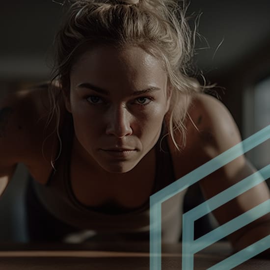 A determined woman with blonde hair does a push-up while looking straight ahead, her face showing intense focus. The image has a modern design element with abstract geometric lines in the foreground. The setting appears to be a clean, minimalistic indoor space.