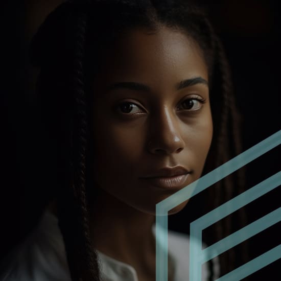 A young woman with long braids gazes directly at the camera, her expression calm and serene. She is wearing a white top, and a translucent geometric shape intersects the lower right corner of the image, adding a modern, abstract touch.