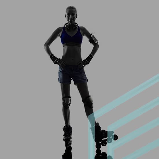 Silhouette of a person standing confidently in rollerblades against a gray background. They are wearing athletic gear, including a blue sports bra, shorts, knee pads, wrist guards, elbow pads, and headphones around their neck. A turquoise geometric pattern is seen.