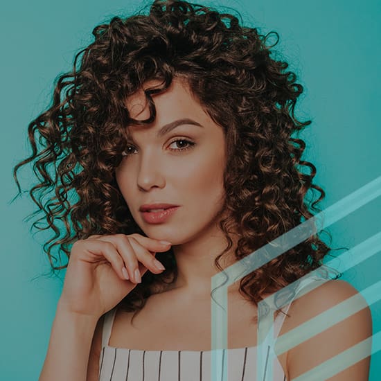 A young woman with curly hair poses against a turquoise background. She has her hand near her face, and she's wearing a sleeveless, white and black striped top. Transparent lines intersect at the bottom right of the image.